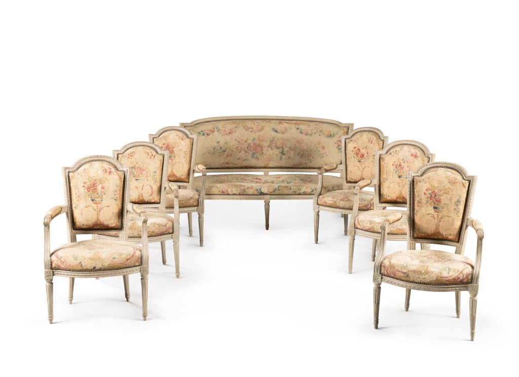 View full screen - View 1 of Lot 236. A white lacquered beechwood seat furniture, Louis XVI, circa 1780 Mobilier de salon en hêtre laqué blanc d'époque Louis XVI, vers 1780.