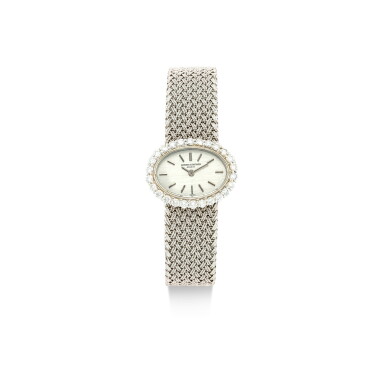 View full screen - View 1 of Lot 865. VACHERON CONSTANTIN | A WHITE GOLD AND DIAMOND-SET BRACELET WATCH, CIRCA 1970.