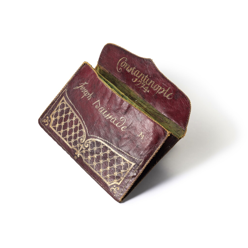 View full screen - View 1 of Lot 113. An Ottoman silver and gilt-thread embroidered red leather pochette, Turkey, Constantinople, dated 1774.
