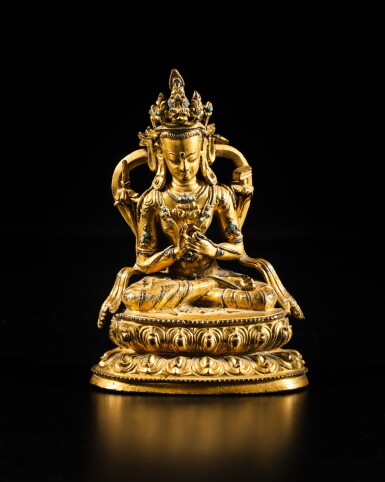 View full screen - View 1 of Lot 5. A gilt-copper alloy figure of Manjushri, Tibet, 14th century | 十四世紀 藏傳銅合金鎏金文殊菩薩坐像.