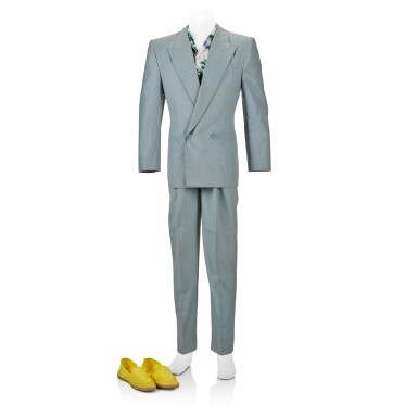 View full screen - View 1 of Lot 259. Freddie Mercury's turquoise lounge suit by Antony Price, Ivor Novello Awards, 1987, with Hawaiian shirt and espadrilles.