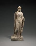 A ROMAN MARBLE FIGURE OF APHRODITE, GREECE, CIRCA 2ND CENTURY A.D.