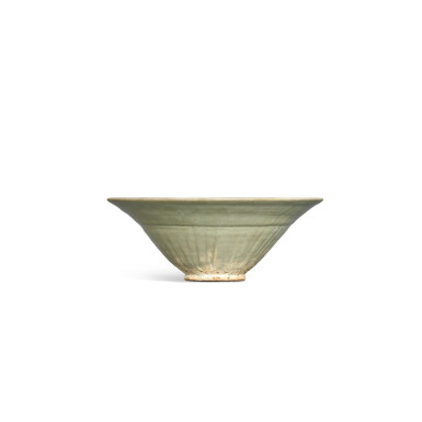 View full screen - View 1 of Lot 8910. A large moulded Northern celadon 'peony' bowl Jin dynasty | 金 北方青釉印牡丹紋笠式盌.