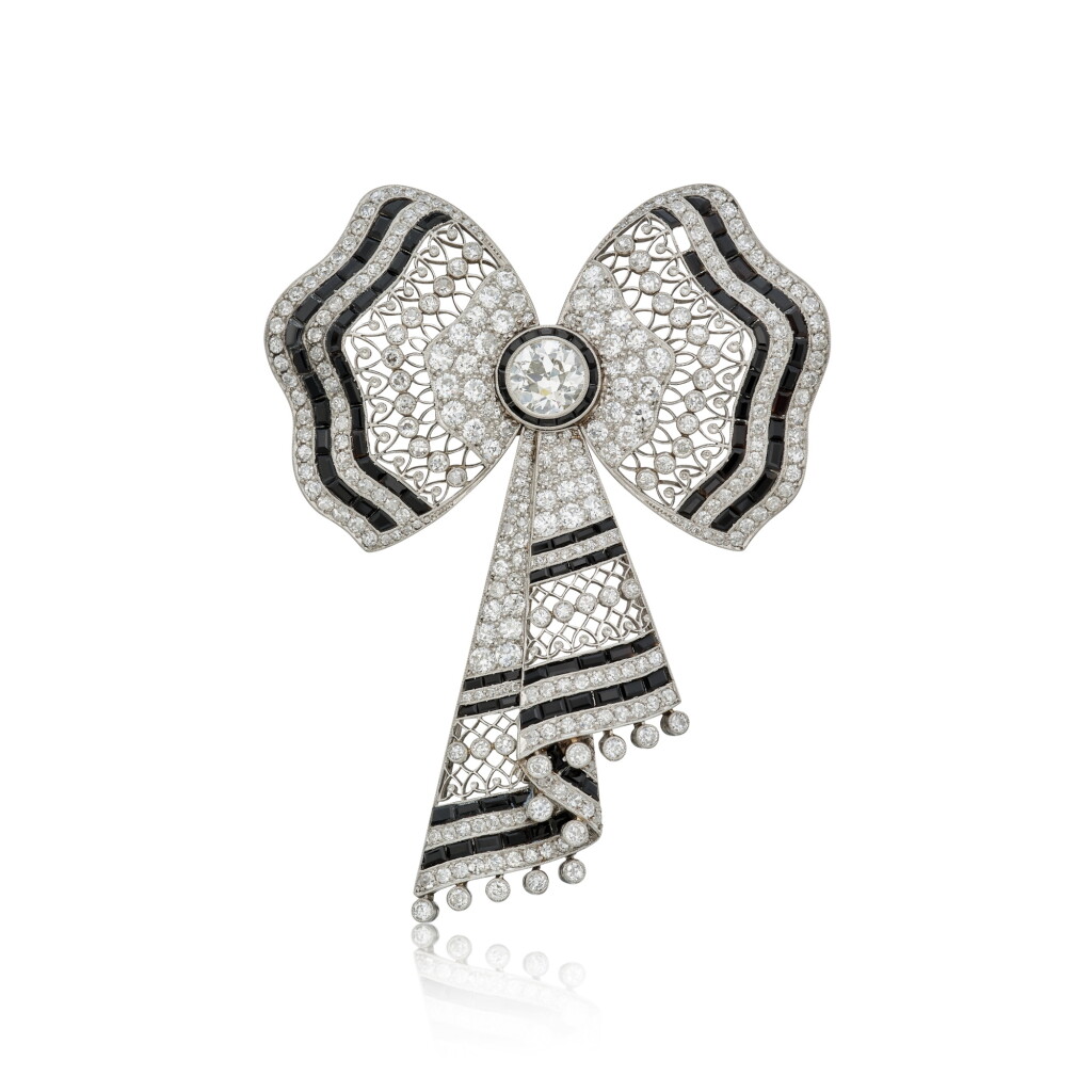 View full screen - View 1 of Lot 135. Diamond and Onyx Brooch.