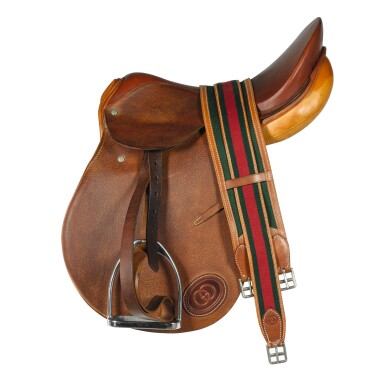 View full screen - View 1 of Lot 56. A Gucci Tan Leather Saddle Late 20th Century .