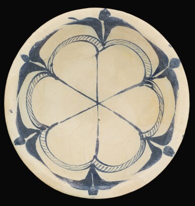 View full screen - View 1 of Lot 96. AN ABBASID TIN-GLAZED POTTERY BOWL, IRAQ, 9TH/10TH CENTURY.