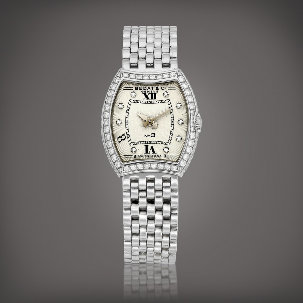 View full screen - View 1 of Lot 982. Reference 304 | A stainless steel and diamond-set wristwatch with bracelet, Circa 1997 | 型號304 | 精鋼鑲鑽石鏈帶腕錶,約1997年製.