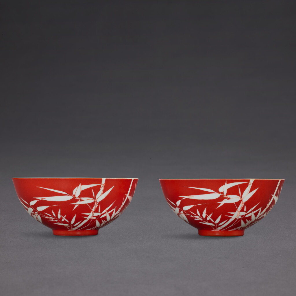 View full screen - View 1 of Lot 3503. A fine and rare pair of coral-ground reserve-decorated ‘bamboo’ bowls, Seal marks and period of Qianlong | 清乾隆 珊瑚紅地留白竹紋小盌一對 《大清乾隆年製》款.