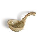 A green-glazed pottery ladle, Han dynasty | 漢 綠釉龍柄勺