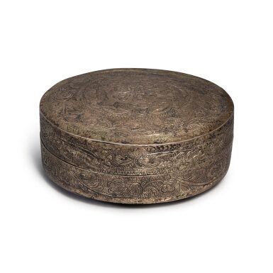 View full screen - View 1 of Lot 330. A copper alloy 'floral' circular box and cover, Tang dynasty | 唐 銅鏨花卉紋蓋盒.