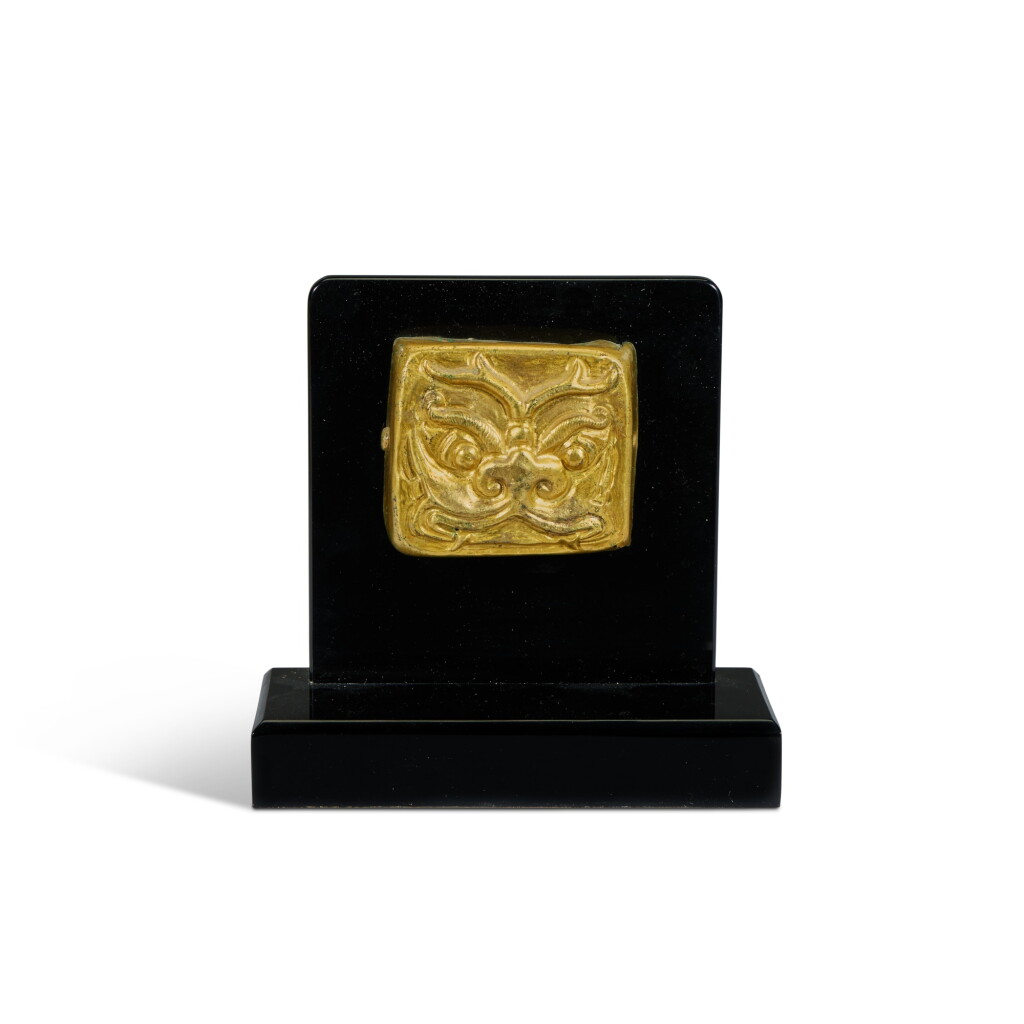 View full screen - View 1 of Lot 561. A gilt-bronze 'monster mask' fitting, Tang dynasty or later.