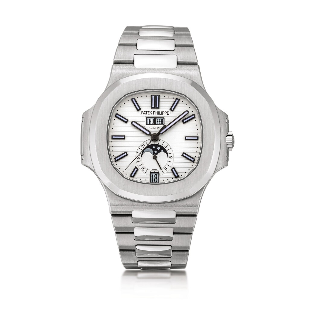 View full screen - View 1 of Lot 2098. Patek Philippe | Nautilus, Reference 5726, A stainless steel annual calendar bracelet watch with moon phases and 24 hours indication, Circa 2019 | 百達翡麗 | Nautilus 型號5726 精鋼年曆鏈帶腕錶,備月相及24小時顯示,約2019年製.