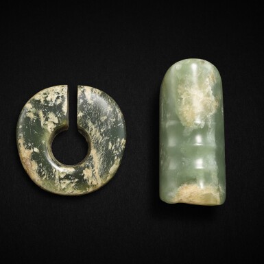 View full screen - View 1 of Lot 509. A celadon jade silkworm and a celadon jade slit ring, jue, Neolithic period | 新石器時代 青玉玦及玉蠶.