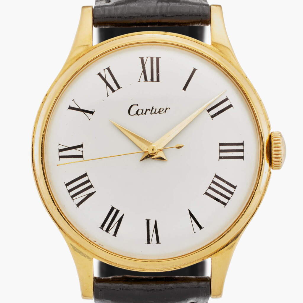 View full screen - View 1 of Lot 23. Grande Ronde | New York retailed: A yellow gold over-sized centre seconds wristwatch with yellow and pink gold deployant buckle, Circa 1955.