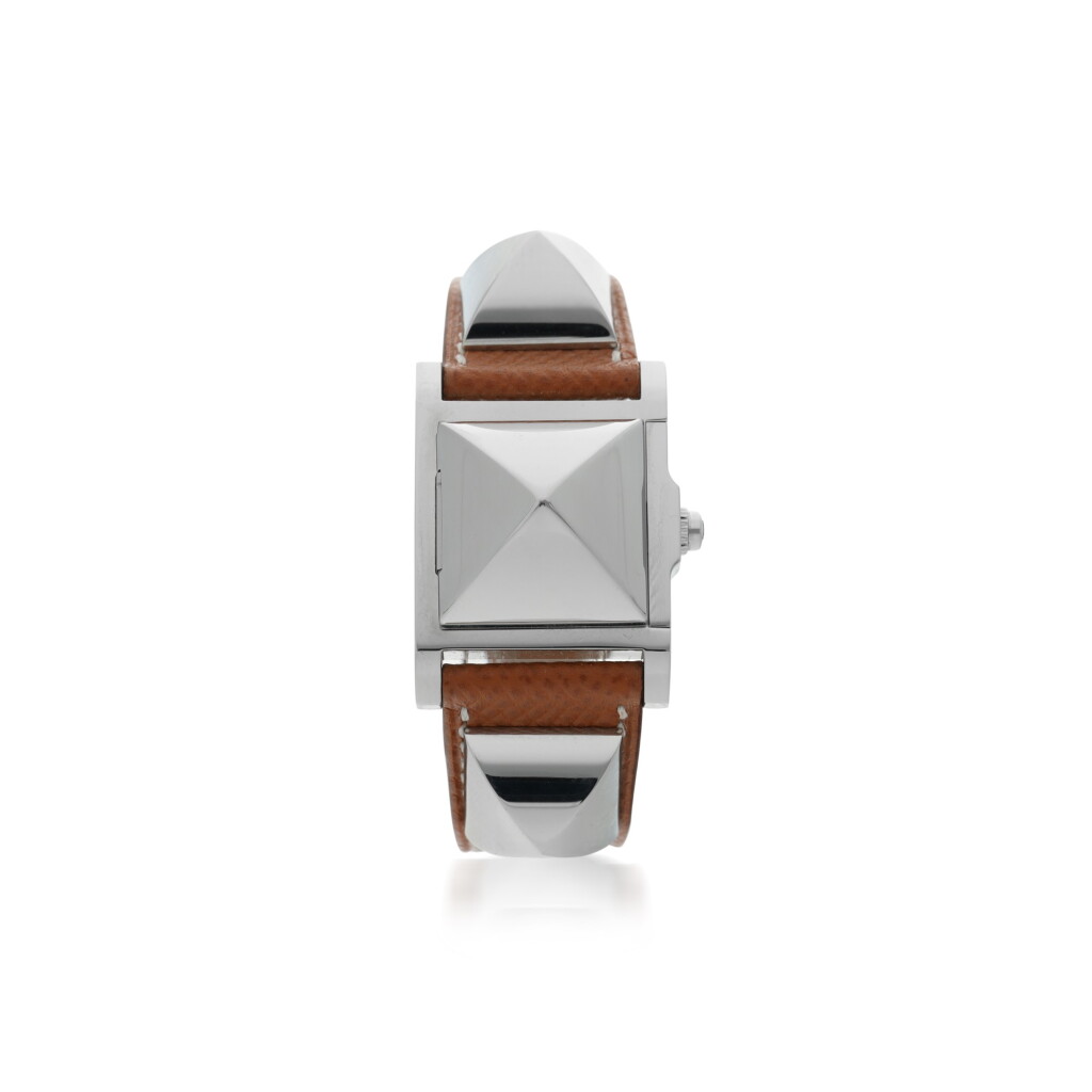 View full screen - View 1 of Lot 59. HERMÈS | REFERENCE ME3.210 MEDOR A STAINLESS STEEL SQUARE WRISTWATCH WITH CONCEALED DIAL, CIRCA 2018.