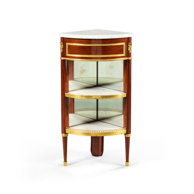 View full screen - View 1 of Lot 235. A mahogany and gilt-bronze encoignure, Louis XVI, circa 1780 Encoignure en acajou et bronze doré d’époque Louis XVI, vers 1780.