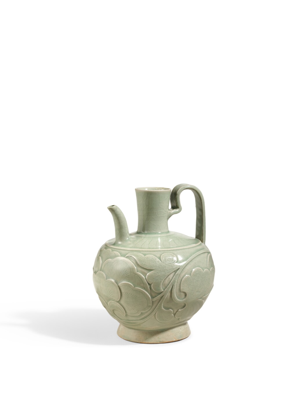 View full screen - View 1 of Lot 2011. A finely carved Yaozhou celadon 'peony' ewer, Five Dynasties – Northern Song dynasty | 五代至北宋 耀州青釉刻纏枝牡丹紋執壺.