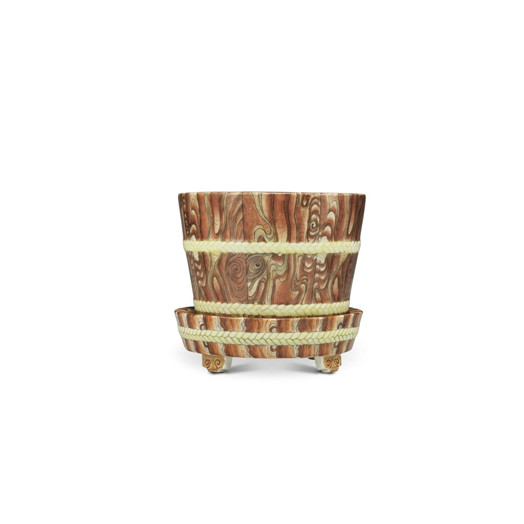 View full screen - View 1 of Lot 41. A faux-bois jardinière and stand, 20th century .