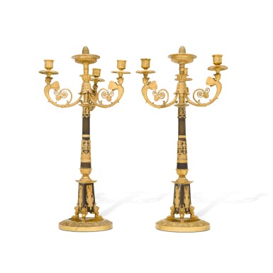 View full screen - View 1 of Lot 112. A pair of Empire style gilt and patinated bronze three-light candelabra, 19th century.