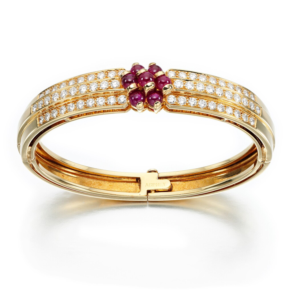 View full screen - View 1 of Lot 42. Asprey & Co. | Ruby and diamond bangle, circa 1997.