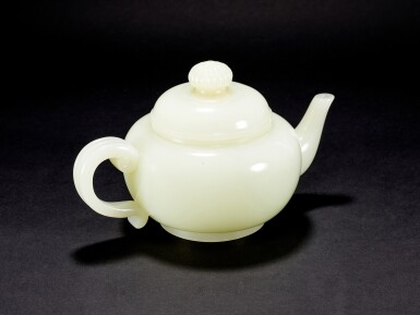 View full screen - View 1 of Lot 9826. An exceptional and large white jade teapot and cover, Qing dynasty, Qianlong period | 清乾隆 御製白玉光素菊花鈕茶壺.