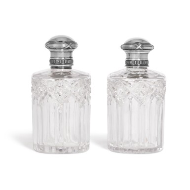 View full screen - View 1 of Lot 503. A pair of Fabergé silver-mounted cut-glass scent bottles, Moscow, 1908-1917.
