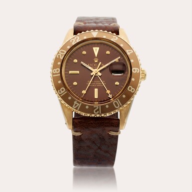 View full screen - View 1 of Lot 617. Reference 1675 GMT-Master | A yellow gold automatic dual time wristwatch with date, Circa 1966.