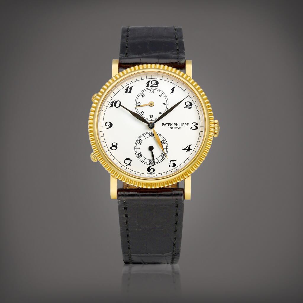 View full screen - View 1 of Lot 8641. Reference 5034 | A yellow gold dual time zone wristwatch with 24 hours indication, Circa 2001 | 百達翡麗 | 型號5034 | 黃金兩地時間腕錶,備24小時顯示,約2001年製.