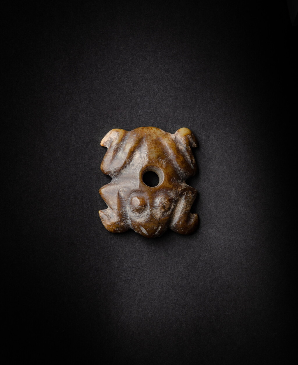View full screen - View 1 of Lot 92. A brown jade ‘frog’ pendant, Probably Neolithic period, Hongshan culture | 或新石器時代 紅山文化玉雕蛙飾.