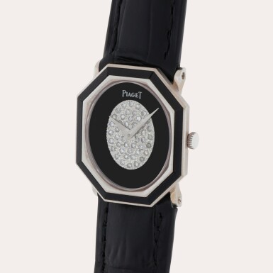 View full screen - View 1 of Lot 214. Reference 9341 | A white gold diamond and onyx-set wristwatch | Circa 1975.