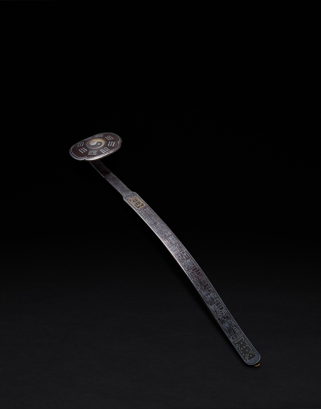 View full screen - View 1 of Lot 55. An inscribed gold and silver-inlaid iron ruyi sceptre, By Zhang Aochun, dated to the renxu year of the Tianqi reign (in accordance with 1622).
