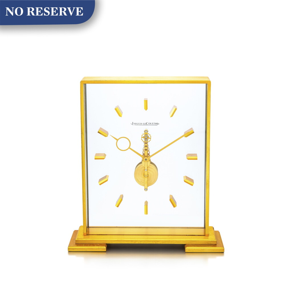 View full screen - View 1 of Lot 866. JAEGER-LECOULTRE | A GILT BRASS TABLE CLOCK WITH 8 DAYS POWER RESERVE, CIRCA 1970.