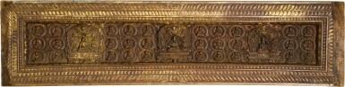 View full screen - View 1 of Lot 306. A rare and well carved gilt-wood Prajnaparamita sutra cover, Tibet, 14th/15th century | 十四/十五世紀 藏傳漆金木雕般若佛母經書板.