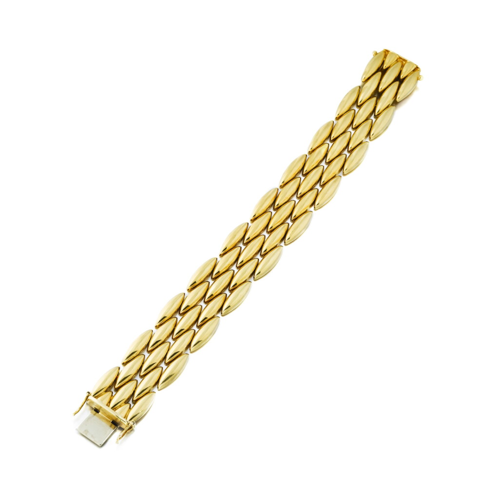 View full screen - View 1 of Lot 102. Cartier | Bracelet or, "Gentiane" | Gold bracelet, 'Gentiane'.