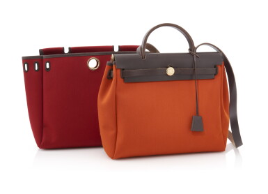 View full screen - View 1 of Lot 69. Red and orange canvas and brown leather tote with yellow hardware, 2 in 1 Herbag, Hermès, 2004.