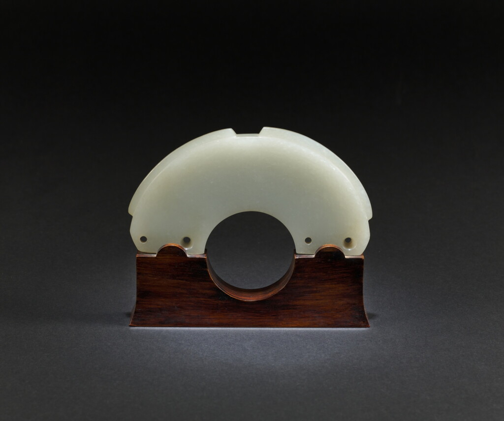View full screen - View 1 of Lot 88. A white jade semi-circular pendant (Huang), Ming dynasty or earlier.
