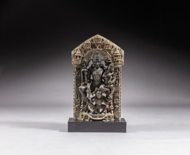 View full screen - View 1 of Lot 60. A black stone seated figure of Lakshminaryana, India, Rajasthan, circa 15th century | 印度 拉賈斯坦邦 約十五世紀 黑石雕吉祥天女與毗濕奴坐像.