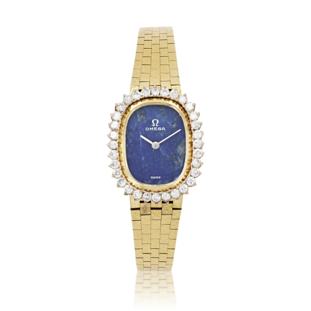 View full screen - View 1 of Lot 453. Omega | Montre bracelet de dame lapis lazuli or et diamants | Lady's lapis lazuli gold and diamond bracelet watch.