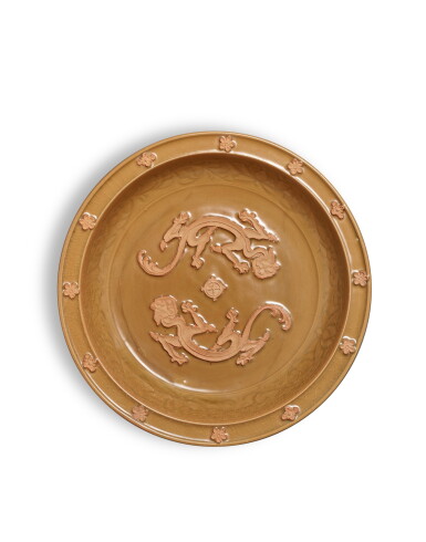 View full screen - View 1 of Lot 3691. A Longquan biscuit-decorated 'dragon' charger, Song dynasty | 宋 龍泉窰露胎素貼雙龍紋折沿盤.