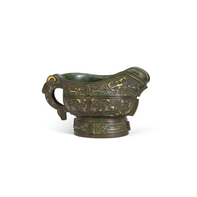 View full screen - View 1 of Lot 53. A small archaistic gold and silver-inlaid bronze pouring vessel (Guang), Ming dynasty.