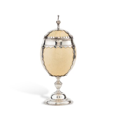 View full screen - View 1 of Lot 100. A silver-mounted ostrich egg cup, probably Lewis Hamon London circa 1740 | Oeuf d'autruche monté en argent probablement par Louis Hamon Londres vers 1740.