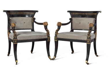 View full screen - View 1 of Lot 262. A PAIR OF REGENCY EBONIZED AND PARCEL-GILT ARMCHAIRS ATTRIBUTED TO MOREL AND HUGHES, CIRCA 1815.