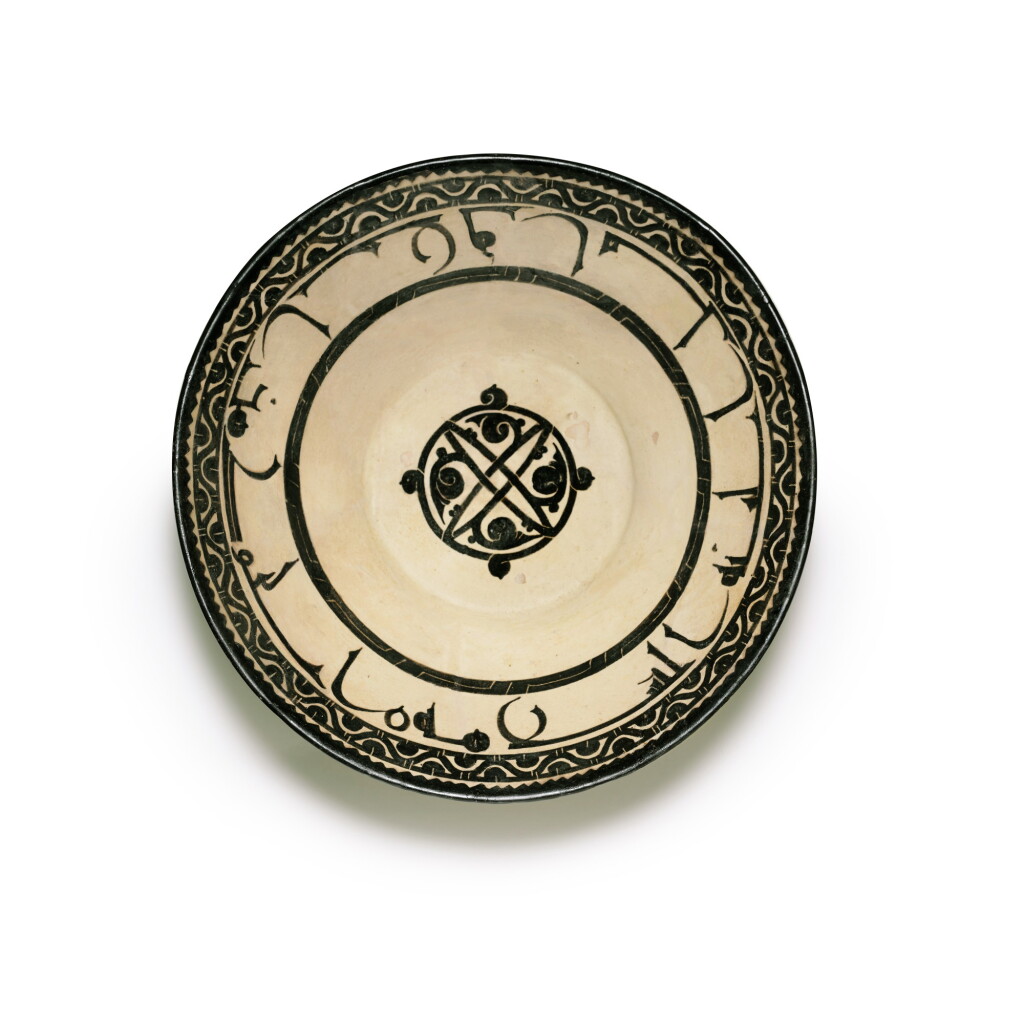 View full screen - View 1 of Lot 61. A large Nishapur calligraphic pottery dish, Eastern Persia or Samarqand, 10th century.