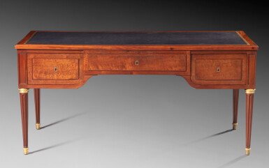 View full screen - View 1 of Lot 46. A gilt-bronze, mahogany and acajou mouchete desk, Louis XVI, attributed to Jean-Henri Riesener, circa 1780 | Bureau à caisson en acajou et acajou moucheté et montures de bronze doré d'époque Louis XVI, attribué à Jean-Henri Riesener, vers 1780.