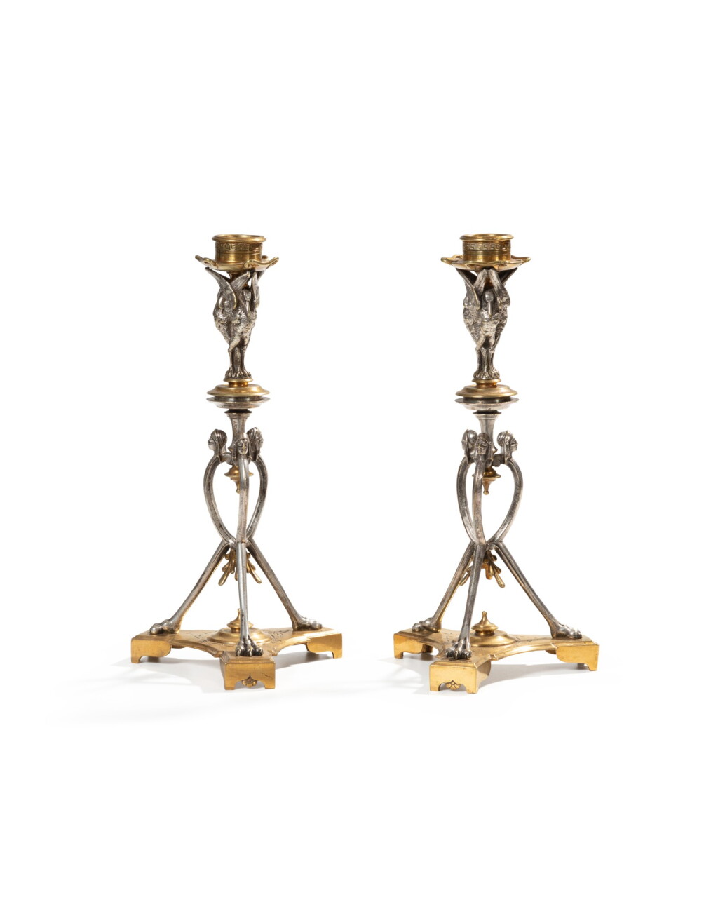 View full screen - View 1 of Lot 111. A pair of neo-pompeian gilt and silver gilt bronze candlesticks, signed Maison Christofle, late 19th century | Paire de flambeaux néo-pompéiens en bronze doré et argenté, signés par la Maison Christofle, fin du XIXeme siècle.