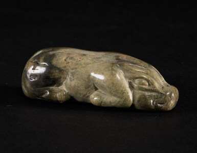 View full screen - View 1 of Lot 239. A CALCIFIED JADE PIG HAN DYNASTY OR LATER | 漢或以後 雞骨白玉豚.