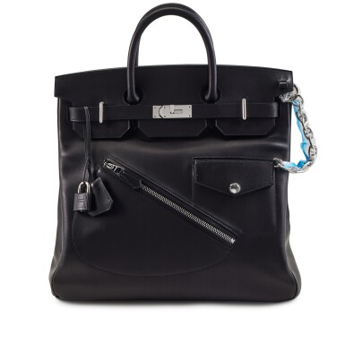View full screen - View 1 of Lot 89. Limited Edition Black Volupto Rock HAC Haut à Courroies Birkin 40 Palladium Hardware, 2023.