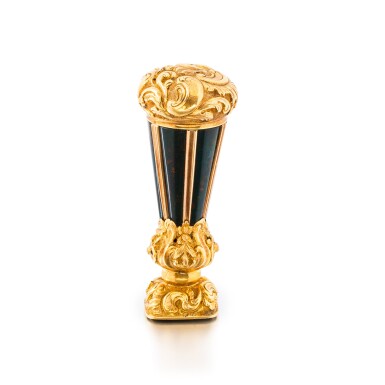 View full screen - View 1 of Lot 1135. A gold-mounted bloodstone desk seal, English, circa 1820.