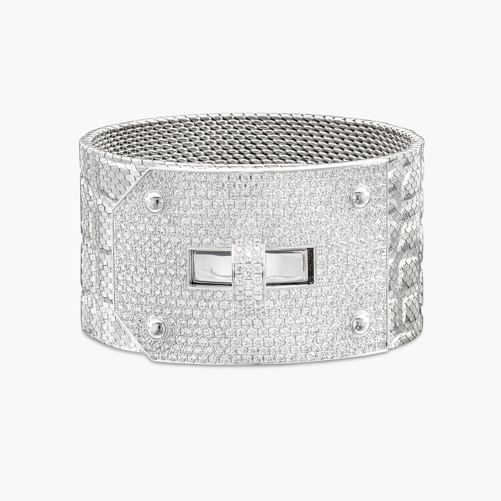 View full screen - View 1 of Lot 1275. Gold and Diamond 'Kelly' Bracelet | 愛馬仕 | K金 配 鑽石 'Kelly' 手鏈.