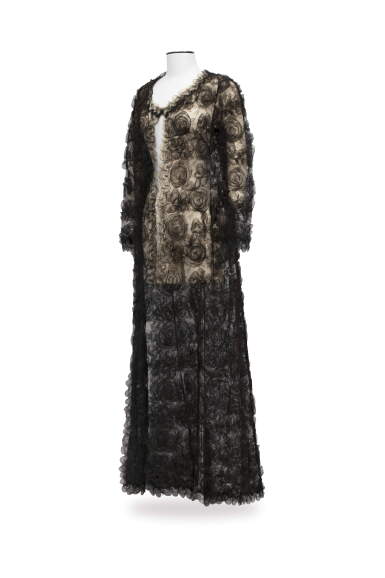 View full screen - View 1 of Lot 90. Unlabeled, circa 1966, Black gathered tulle long coat | Sans griffe, Manteau en voile de tulle noir froncé.